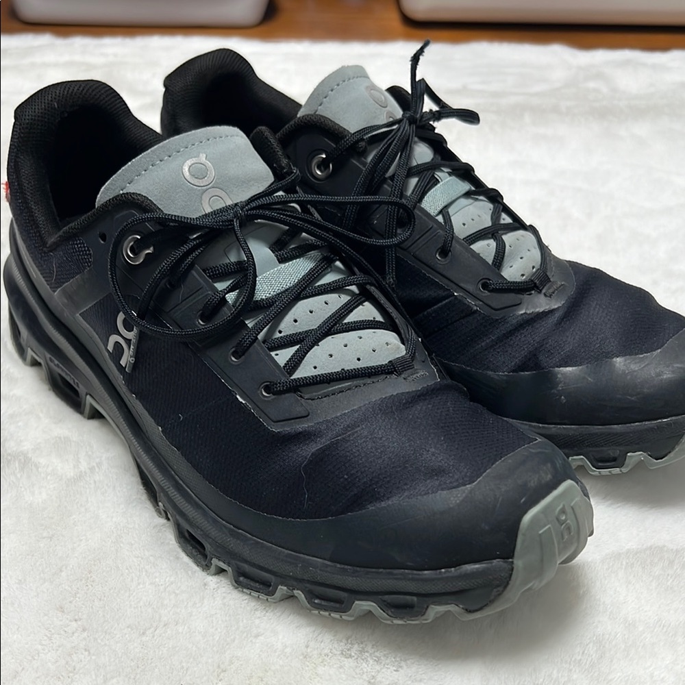 On Running Black and Gray Athletic Shoes with Traction Sole